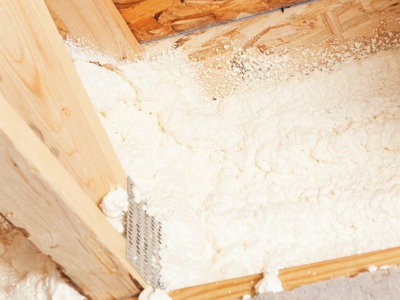 Photo of foam insulation applied in a basement.